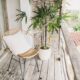 potted plant and chair on balcony
